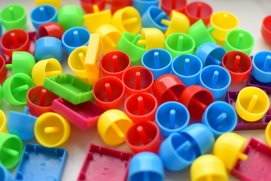 Colourful plastic mosaic pieces in red, blue, green and yellow